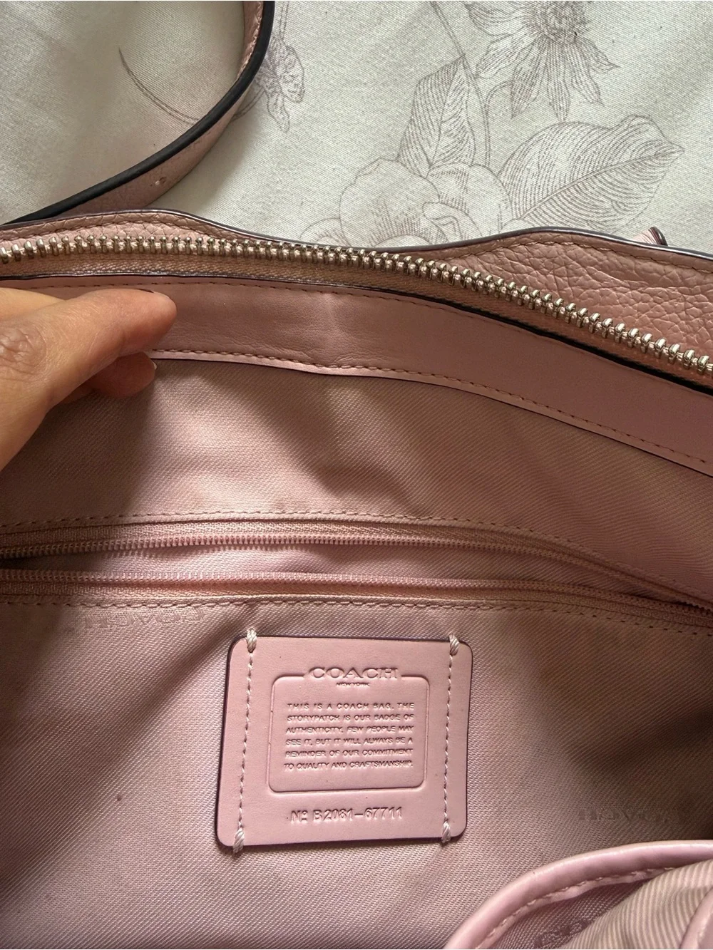 Coach compact pebbled